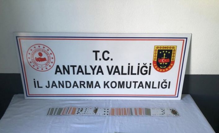 Jandarmadan Tekel markette kumara suçüstü