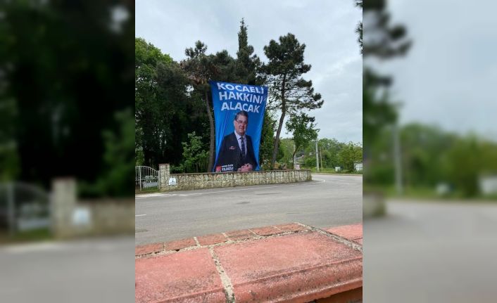 CHP milletvekili adayının seçim afişi mezarlığa asıldı