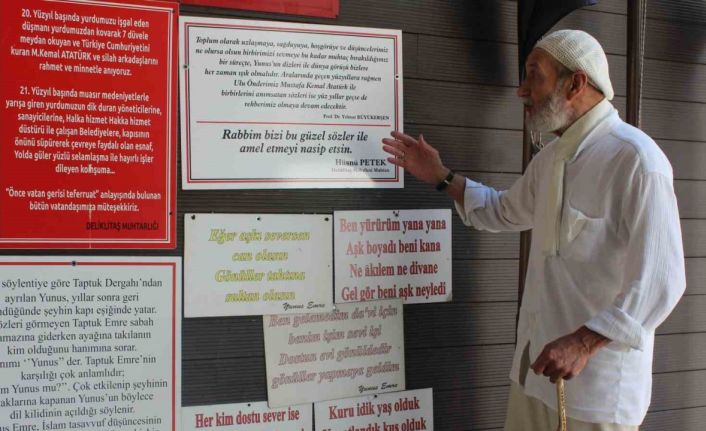 Muhtarlık duvarına astığı Yunus Emre’nin sözleriyle vatandaşların ilgisini çekiyor