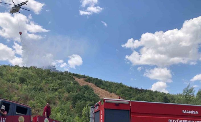 Ormanlık alanda çıkan yangın kısa sürede söndürüldü