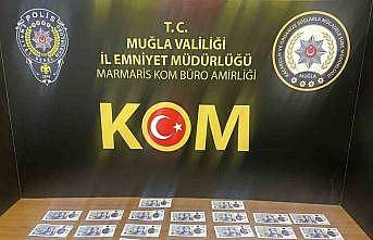 Marmariste İngiliz turist sahte poundla yakalandı